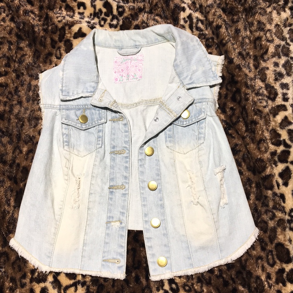 Size S/M- UK size 10. Vintage Denim Vest with rips
